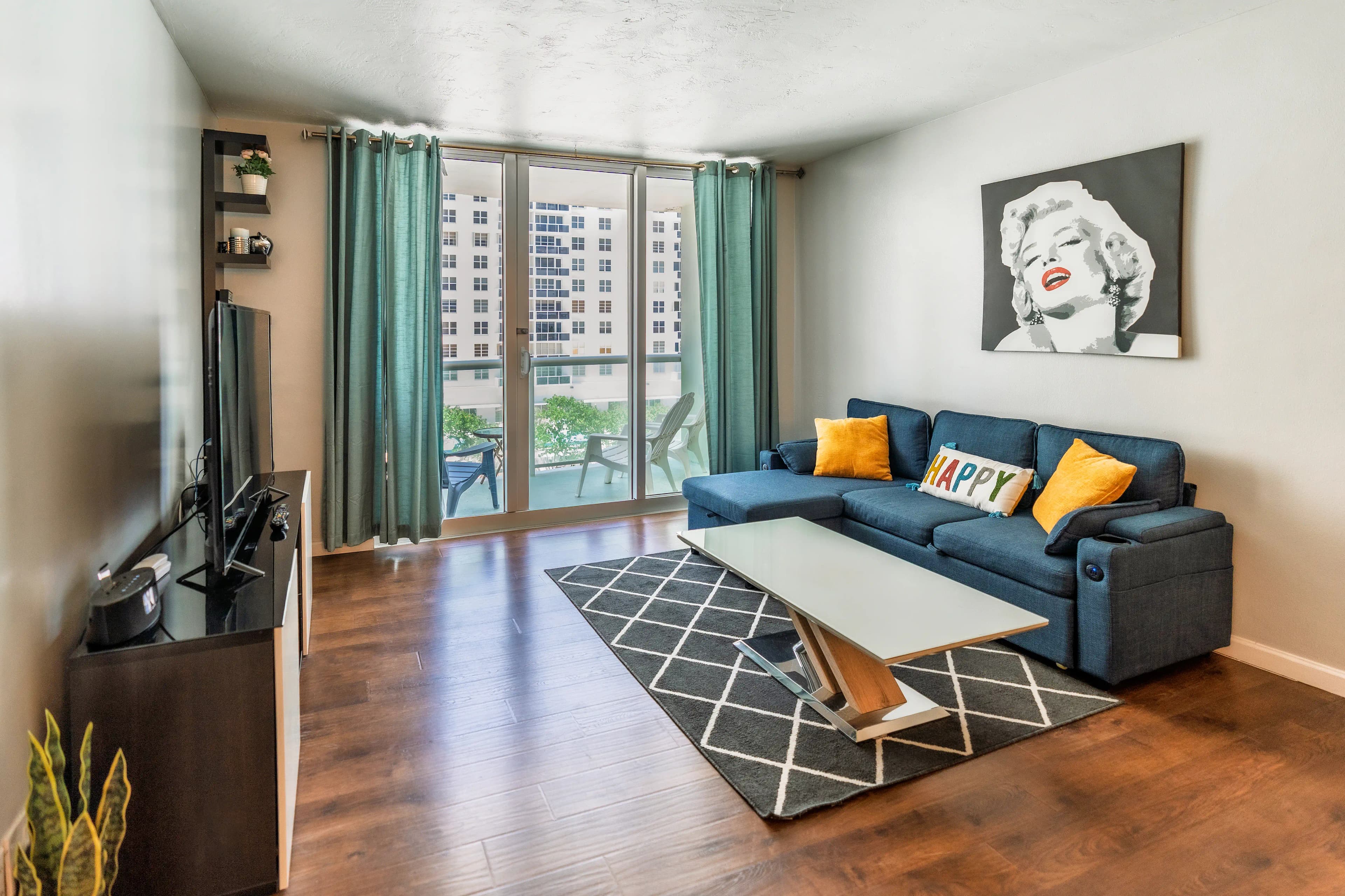 Main living room with large windows